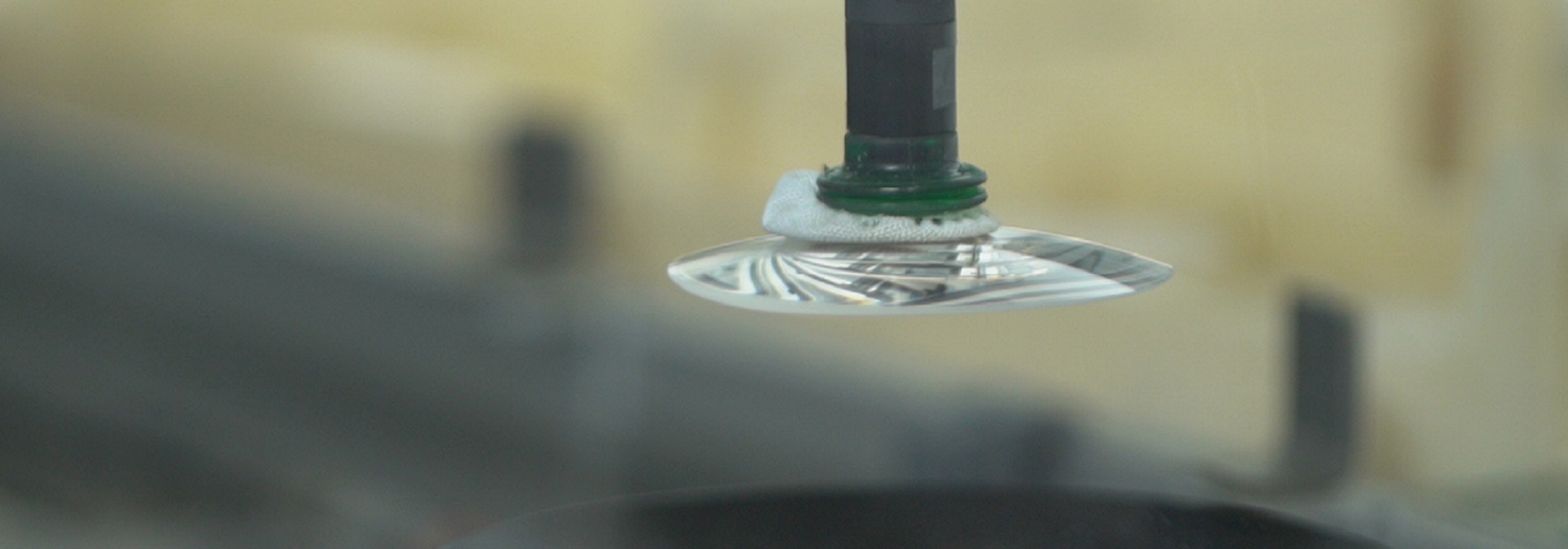 Lens manufacturing in a modern optical lab managed by optical lab management software