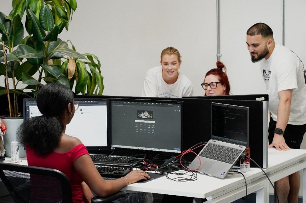 OptiCommerce working in their London Office. 