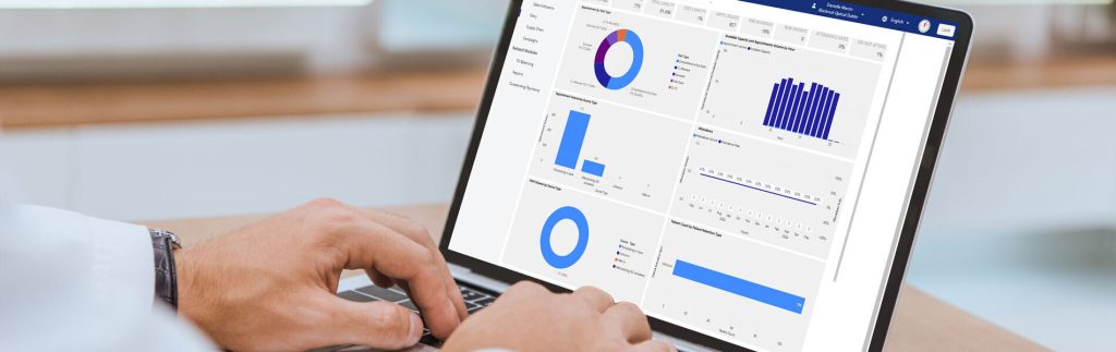 User viewing performance analytics and reports on the Acuitas 3 practice management software dashboard.