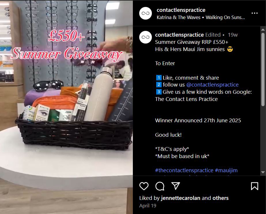 Instagram giveaway post from The Contact Lens Practice promoting a £550+ Summer Giveaway. The image shows a wicker basket filled with prizes including sunglasses, a water bottle, skincare products, and accessories, displayed in front of an eyeglass frame wall. Overlaid text reads “£550+ Summer Giveaway.” The caption explains how to enter by liking, sharing, following the account, and leaving a Google review, with the winner announced on 27th June 2025.